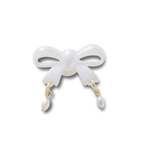 ตัวติดรองเท้า JIBBITZ™ BOW AND PEARL DANGLE